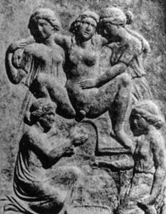 In this ancient Greek relief, a woman is shown squatting on a birth stool with arms around helpers on each side while the midwife catches the baby from below.