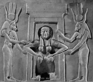In this Egyptian carving, the woman is squatting to push, while bracing herself on helpers and furniture of some sort. Notice her knees are closer together than in the other pictures. Many childbirth educators have observed that the back half of the pelvic outlet in the squatting position actually increases more when the knees are a bit closer together than farther apart.